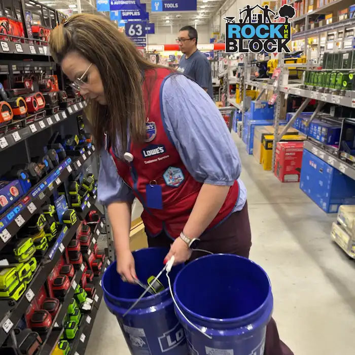 Ceci from Lowe's filling buckets with tools
