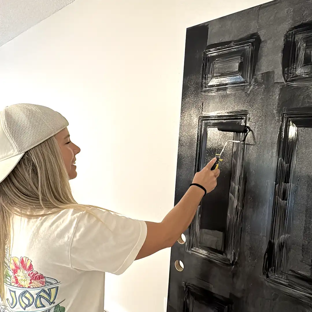 Ashley Painting Her Door